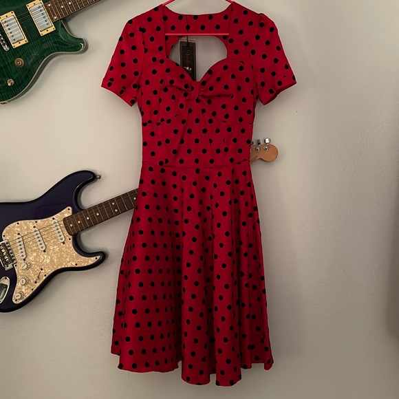 Voodoo Vixen Dresses & Skirts - Red with black polka dots short sleeves with heart buttons dress. NWT sm woman’s